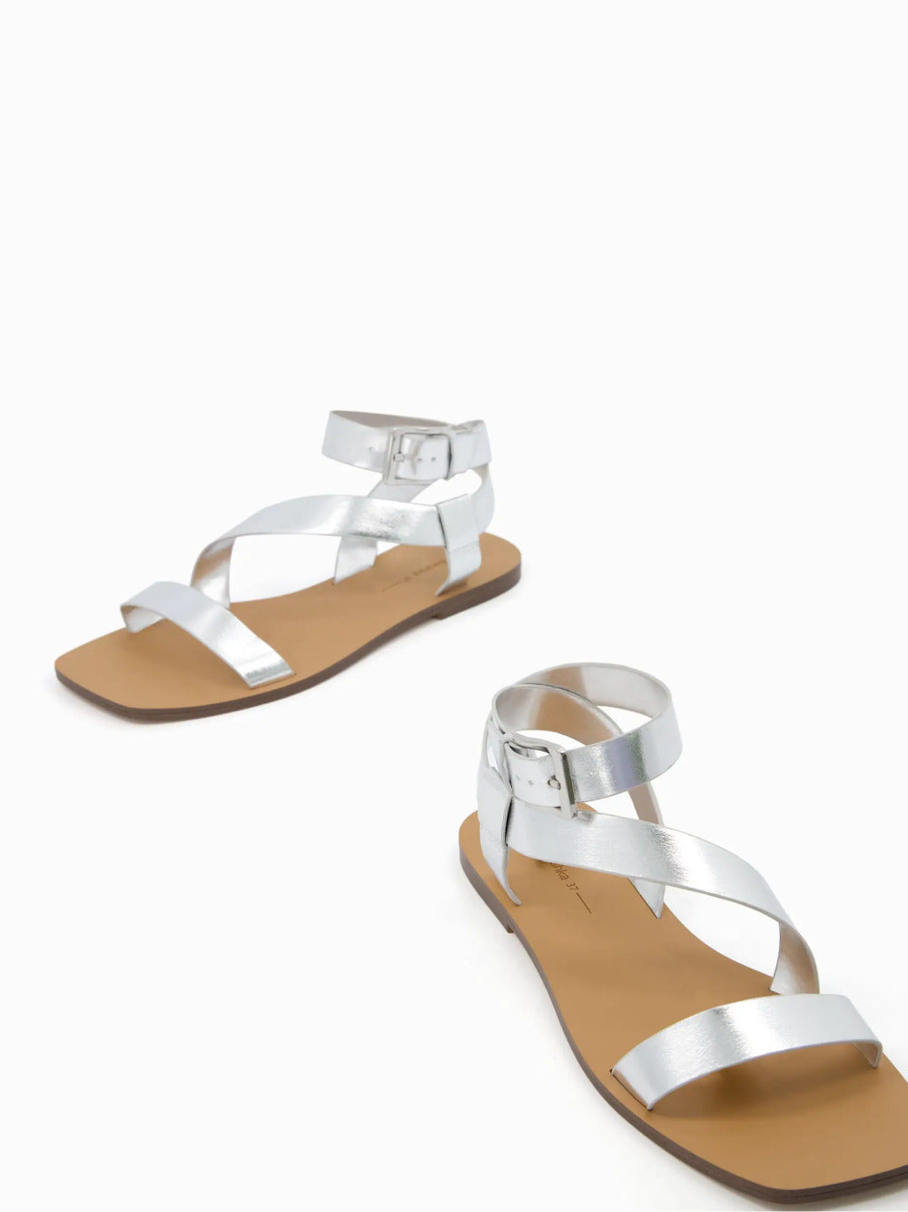 Flat sandals with ankle strap